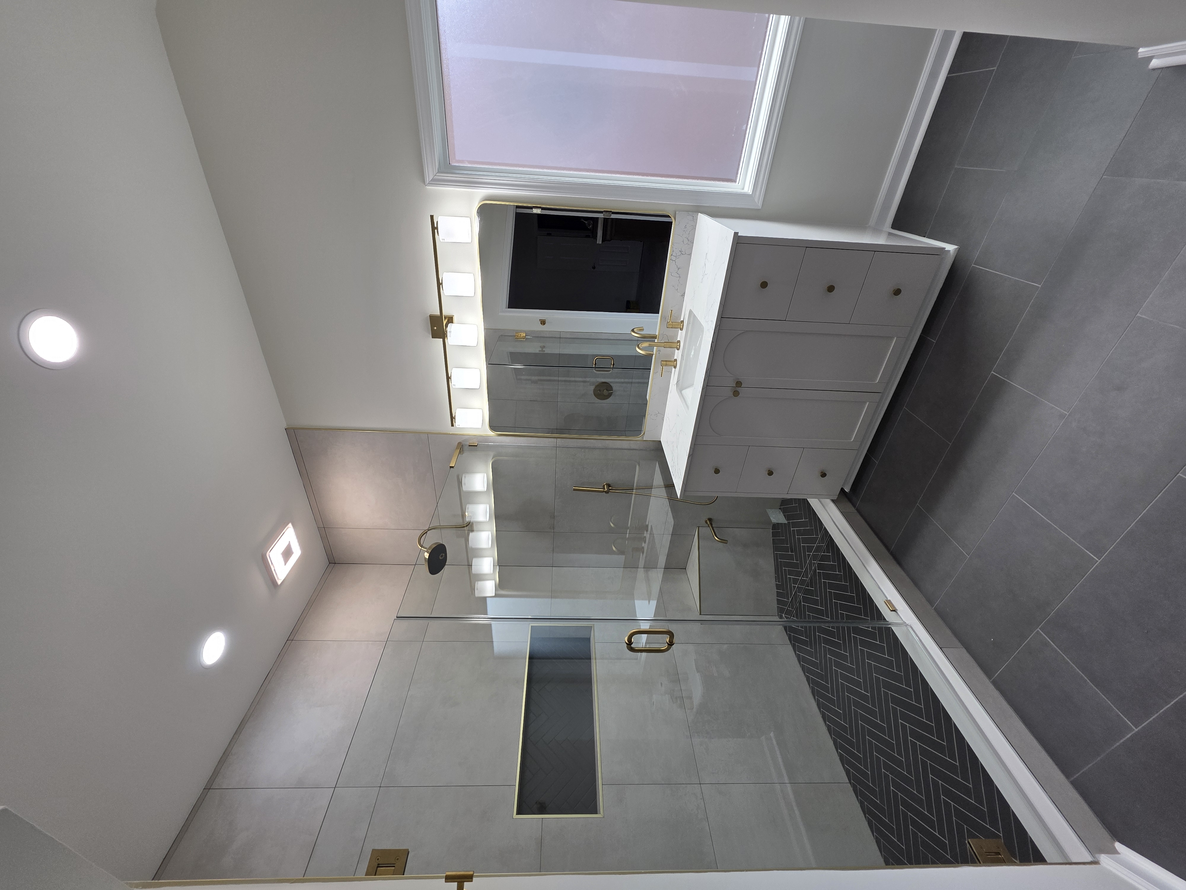 Luxury Master Bathroom with Herringbone Tile